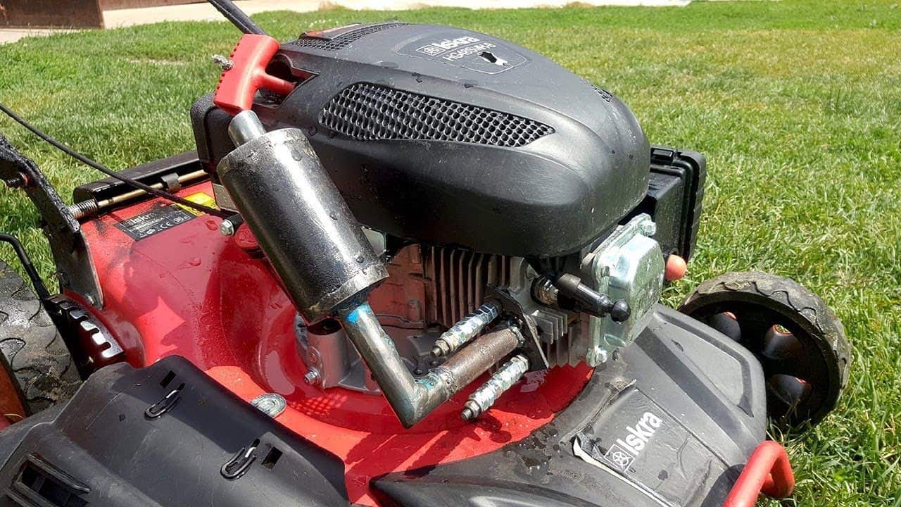 Image of Lawn mower exhaust pipe with spark arrestor